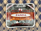 Panda brand food package on a checkered fabric background